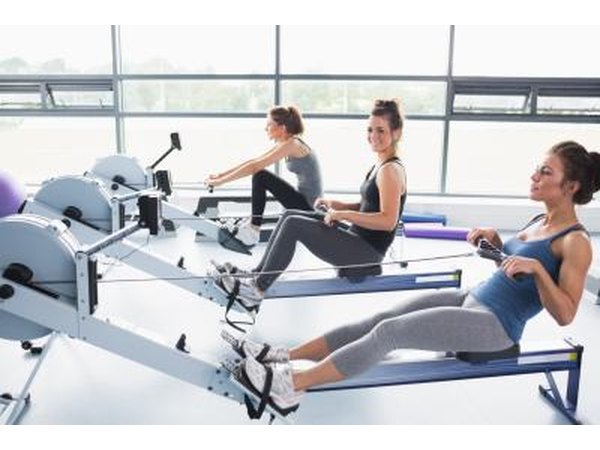 Women exercising on rowing machines