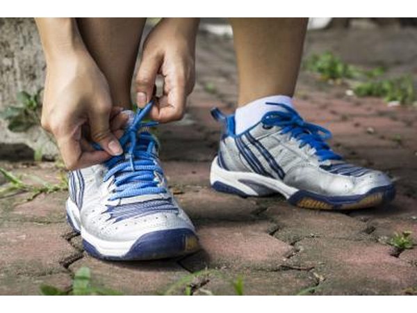 Man tying shoes