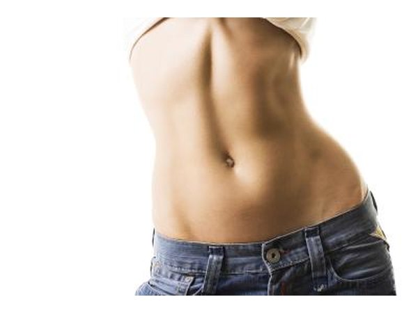 Close up of woman's mid-section and navel.