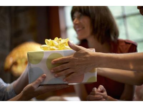 Wrap a “cheeky” prize such as fluffy handcuffs or a plastic ball and chain in several layers.