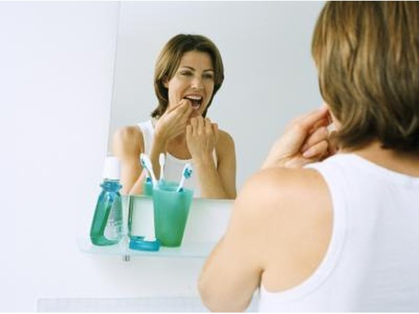 Use teeth whitening strips.