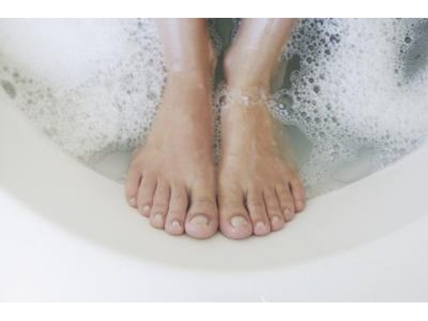 Feet in bubble bath