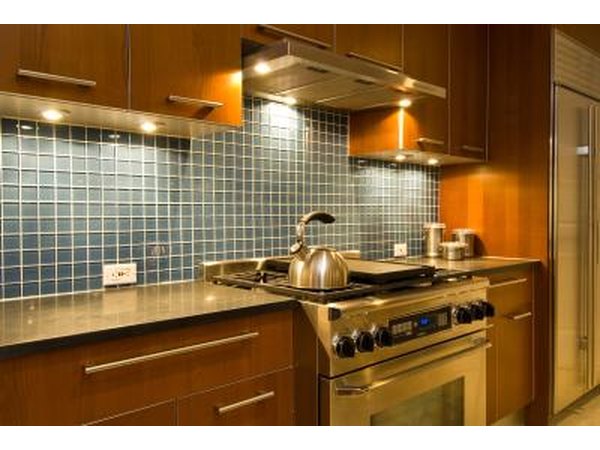 Kitchen cabinets and backsplash.