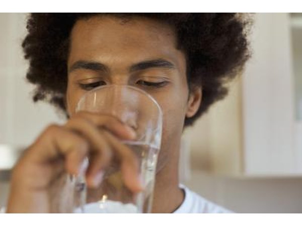 man drinking water
