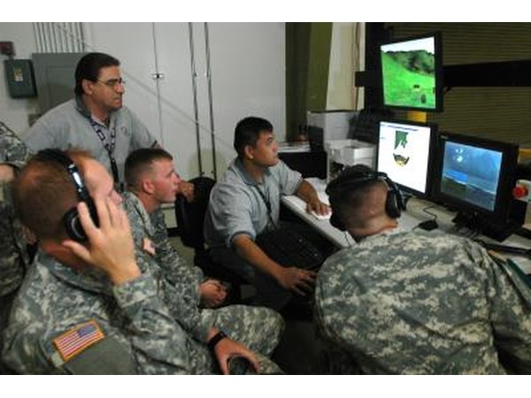 Instructors train military personal on Stryker vehicles