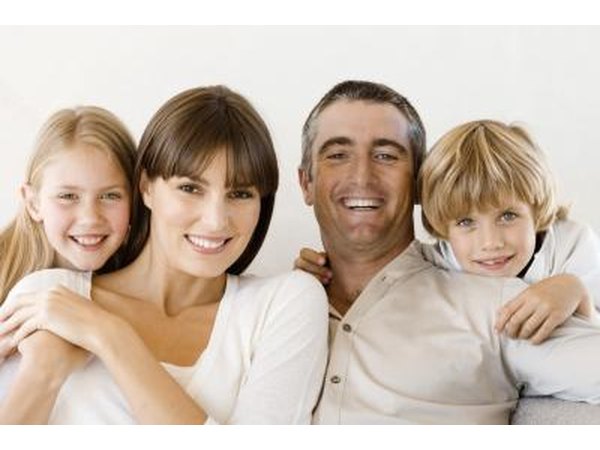 Smiling family with children.