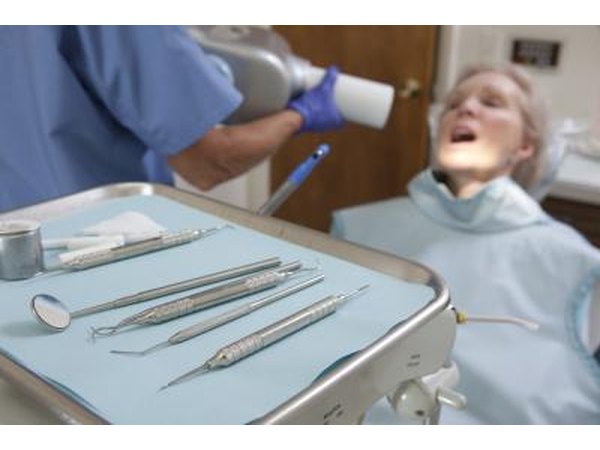 Woman getting x-ray at dentist