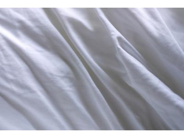 Bed bugs burrow into small places like wrinkles in sheets or gaps in wallpaper.