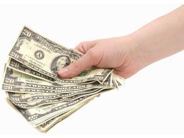 Hand with money.