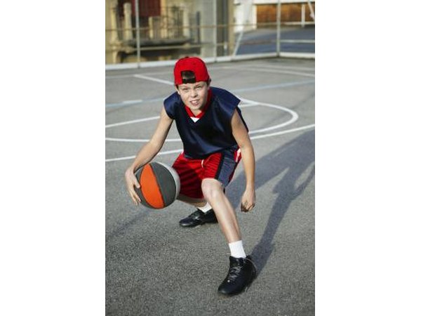 Kid dribbling basketball