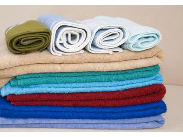 Wet a towel in warm water