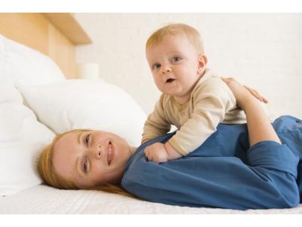 Mother and baby lying down