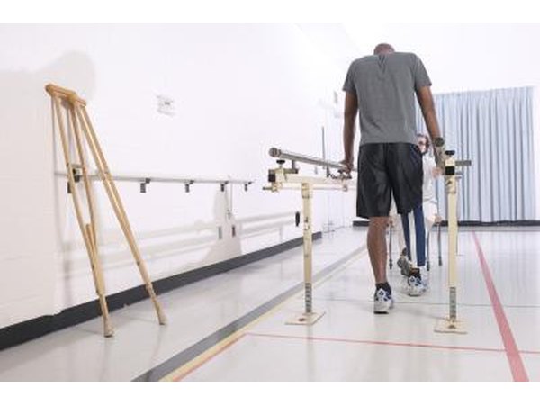 Man in physical therapy room for leg