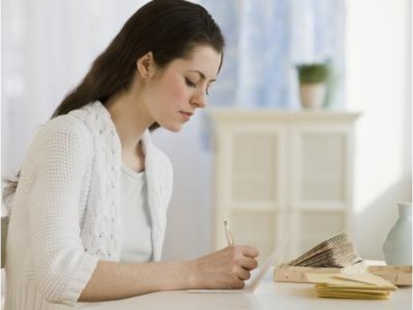 Woman writes a thank you note