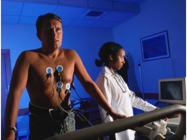 A patient runs on a treadmill as part of a stress test.