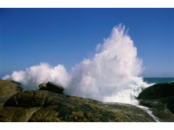 Waves breaking on the shoreline.