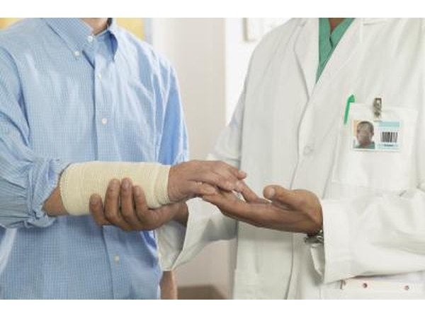 Weakness in the wrist is another common symptom.