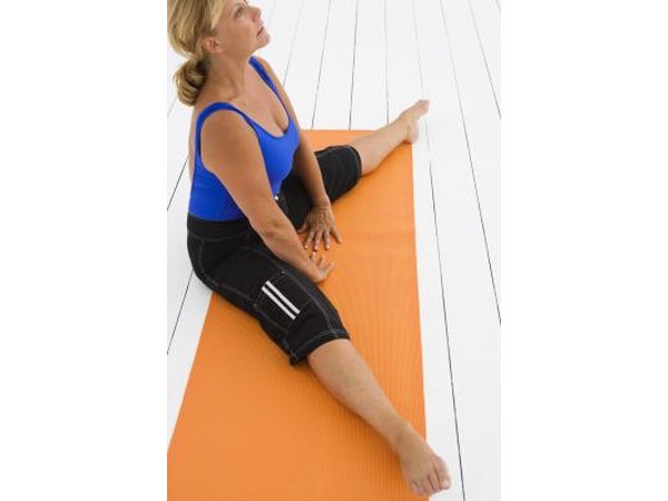 Woman on exercise mat