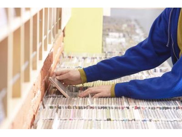 Man searching through cds at store