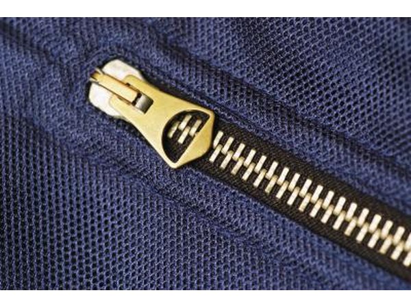 A close-up of a metal zipper.