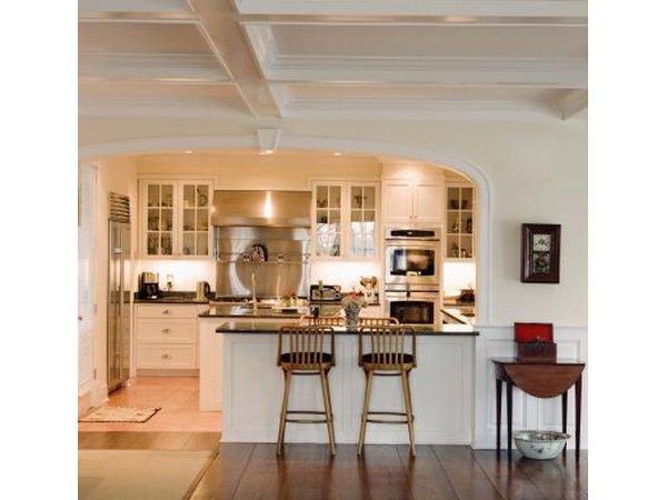 The kitchen or bathroom is the best area to feed the puppies, as the floors are easily cleaned.
