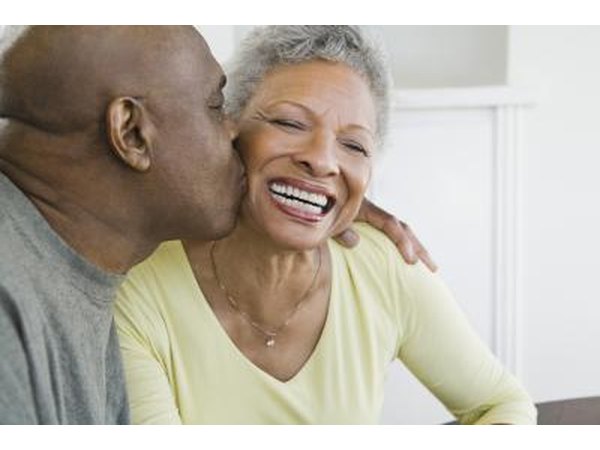 Man kissing wife