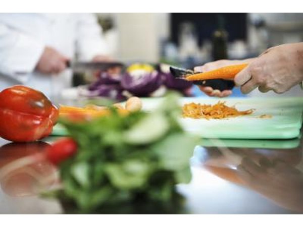 Preparing vegetables in kitchen