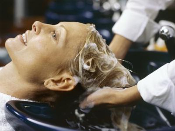 Shampooing hair.