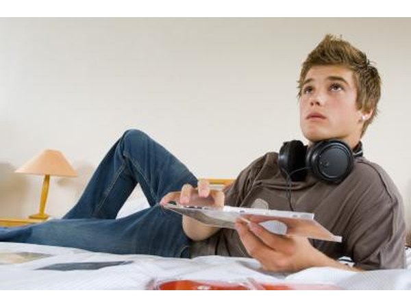 Boy listening to CD