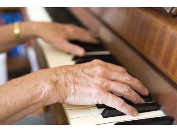 Hands on a piano