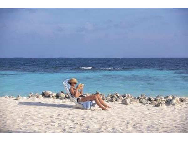 Woman suntanning on beach