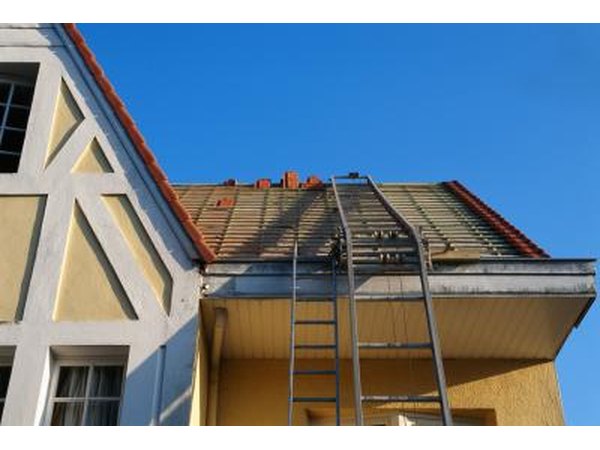 Climb a ladder to the roof, and locate the nail that you just drove through the roof.