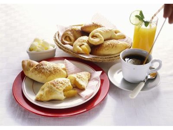 A large number of people drink coffee with breakfast.