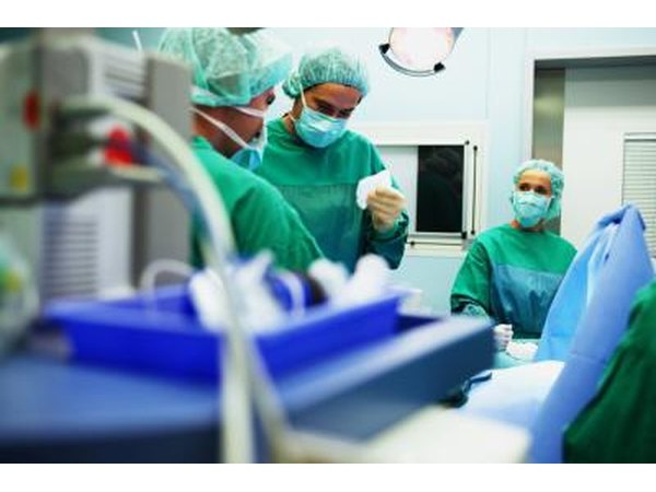 Doctors working on patient