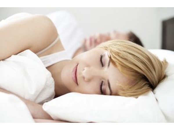 Woman sleeping on pillow