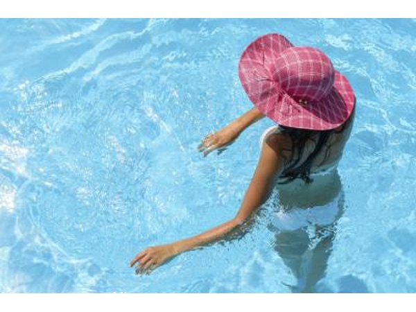 A swimming pool fence must be at least 48 inches high.