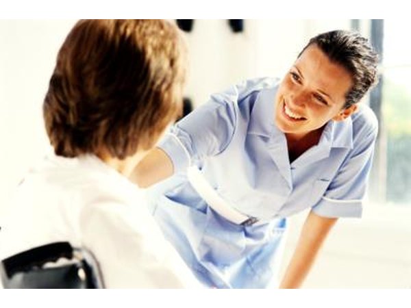 Conversing with patient.
