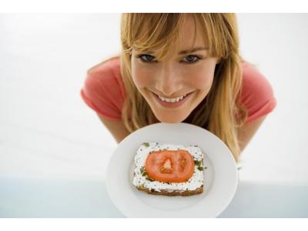 woman with plate of toast