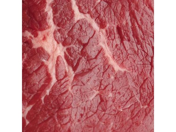Examine the texture on the surface of the meat.