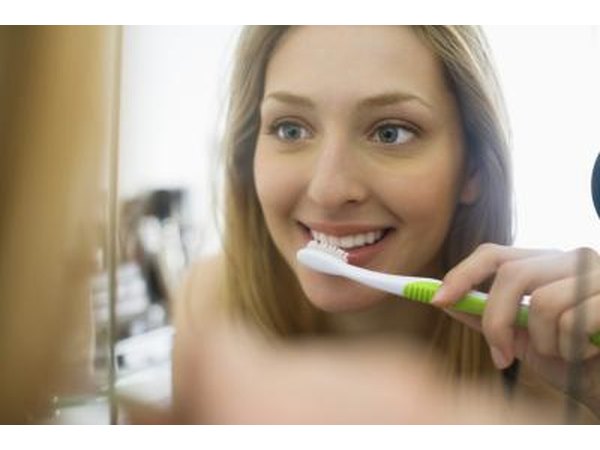 Brush your teeth with warm water and sea salt.