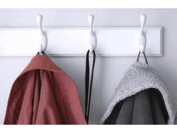 Jackets hanging on hooks in a hallway