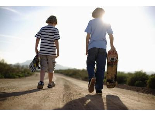 Adolescent boys skateboarding