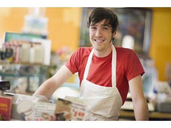 Checkout operator positions are often filled by high school students.