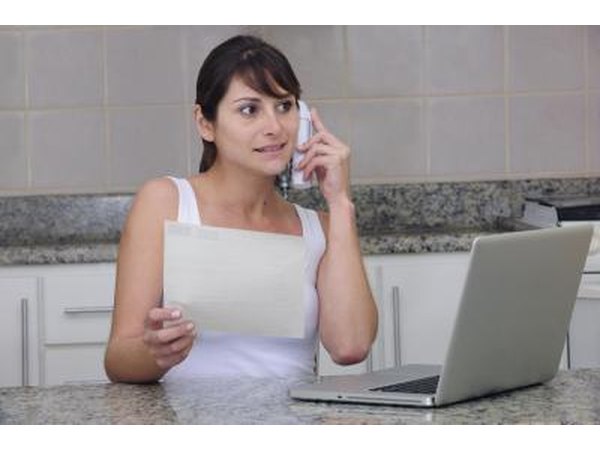 Woman on phone with customer service agent