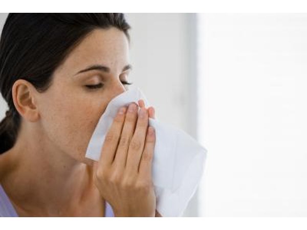 Allergy symptoms may include coughing, sneezing, runny nose, sinus congestion that can cause headaches, itchy throat and red, swollen itchy eyes.