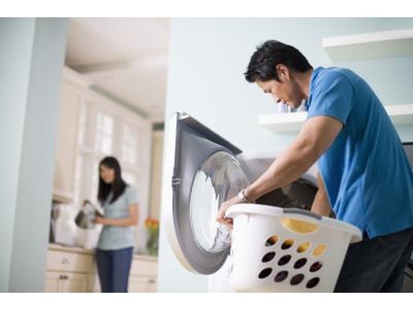 Man washing linens