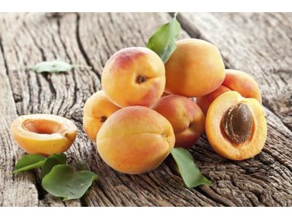 Fresh apricots on a wooden table