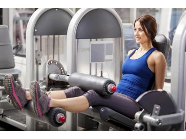 Woman on weight machine