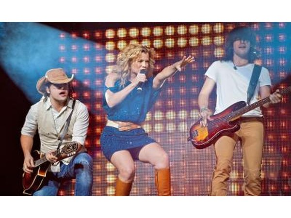 Give her a sweet evening with her favorite band.