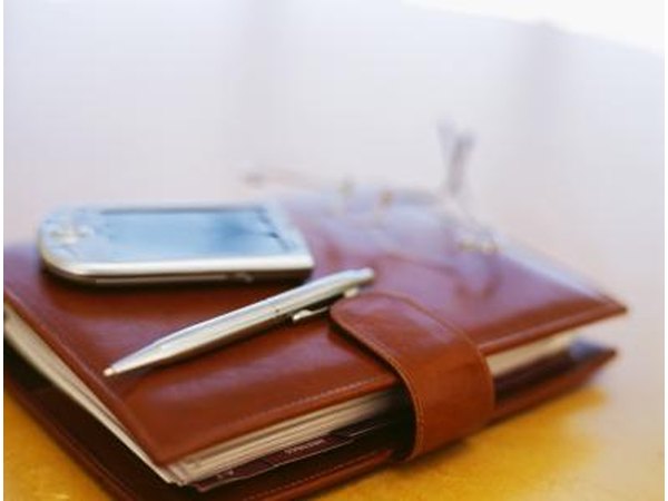 A close-up of a day planner on a desk.